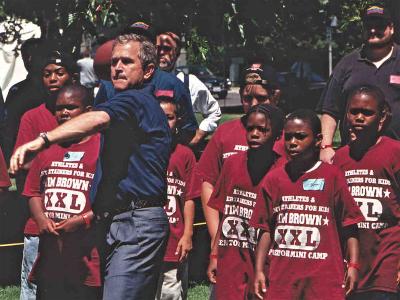 Bush throws a football