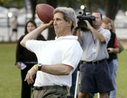 Kerry throws a football